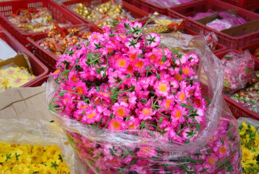Colourful raw materiral decoration to decorate for house on New Year seasonal at Vietnam, Vietnamese like sakura blossom on Tet and use artificial flower to make beautiful for tree