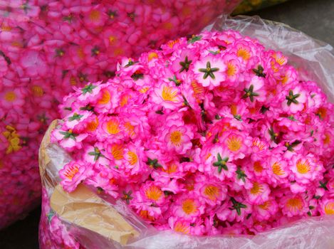 Colourful raw materiral decoration to decorate for house on New Year seasonal at Vietnam, Vietnamese like sakura blossom on Tet and use artificial flower to make beautiful for tree