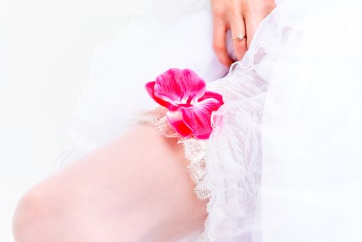 Macro shot of legs in stockings Bride
