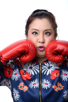 squint eyed crazy woman in boxing gloves isolated on white