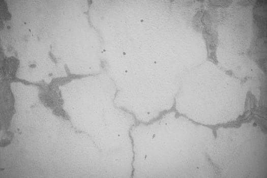 Background from high detailed fragment stone concrete wall, black and white