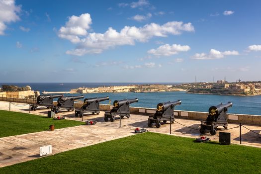 Battery of Cannons facing Harbor in Upper Barrakka Gardens in Valletta, Malta