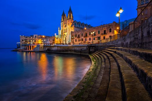 Church of Our Lady of Mount Carmel and Balluta Bay in Saint Julien, Malta