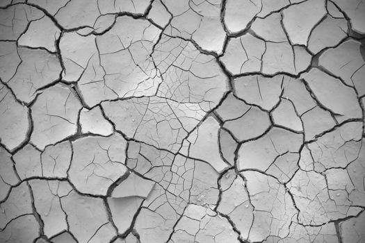 cracked soil ground, drought land so long waterless, close-up, black and white