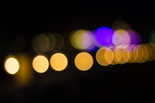 Abstract circular bokeh background of lights in the night.