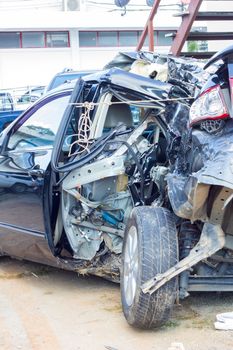 Remains of a wrecked car after a serious car crash, insurance