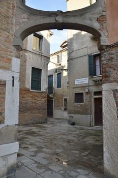 Arch in a alley  in the city of Venice, Italy.