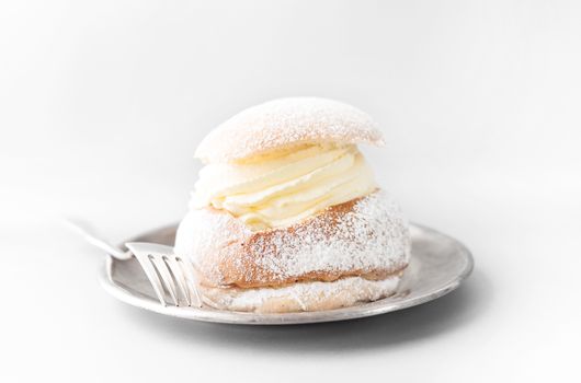Semla, traditional Swedish cream bun, typically eaten in February.