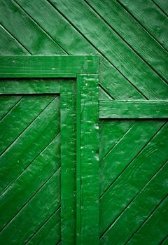 background or texture detail of a green wooden gates