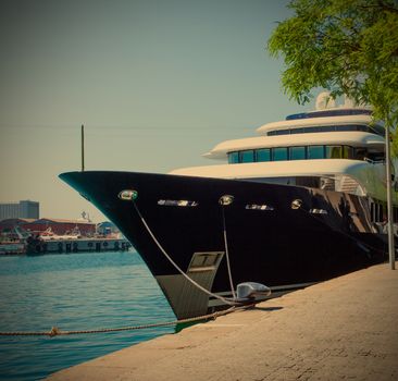 Moll d'Espanya, Barcelona, Spain, JUNY 13, 2013, Black Yacht Martha Ann in the seaport, Editorial use only, instagram image style