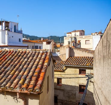 Tossa de Mar, Catalonia, Spain, 06.17.2013, roofs of houses in the old town on the Mediterranean coast