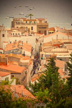 Tossa de Mar, Catalonia, Spain, 2013.06.18, the panorama of the town from the top of the mountain on a cloudy day, instagram image style, editorial use 