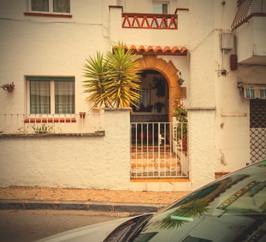 Tossa de Mar, Spain, JUNE 20, 2013: ancient town street at summer day. Instagram image style