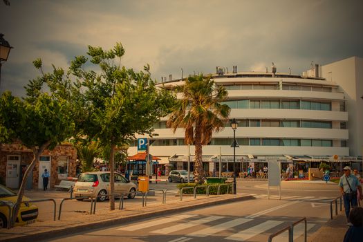 Spain, Catalonia, Tossa de Mar 22.06.2013, promenade street Passeige de Mar, summer evening,  instagram filter style, Editorial use only