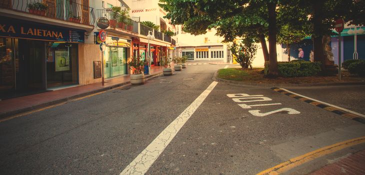 Tossa de Mar, Catalonia, Spain, June 23, 2013: crossroad in the little town at summer early morning. instagram image style