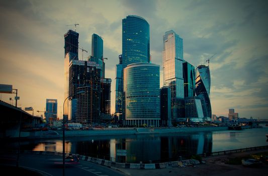 Russia-06.08.2014, the night view of the Moskva River and the business district Moscow City, instagram image style, editorial use only