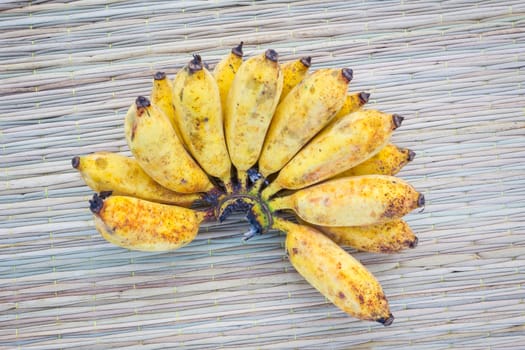Close up bananas on thai traditional mat