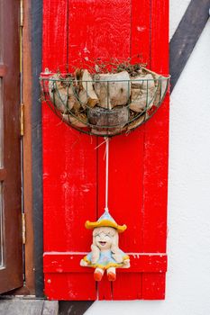 Coir pots on red pole