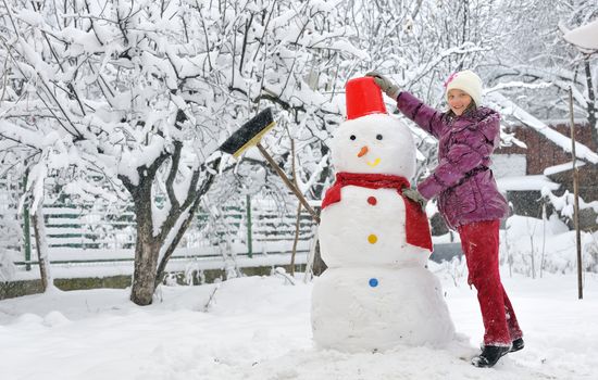snowman and young girl