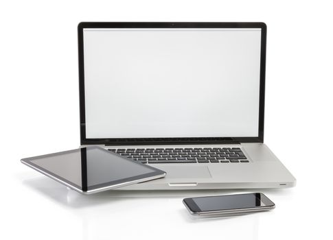 modern computer devices - laptop, tablet and phone with copy space on screen