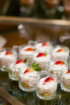 many servings of sweet tasty dessert on buffet