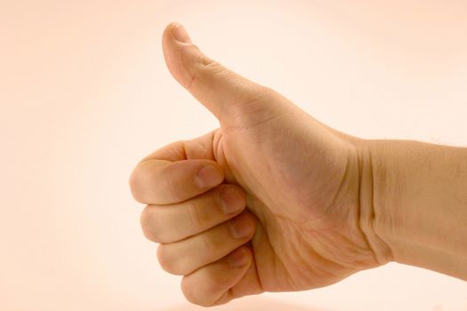 A thumbs up on white background