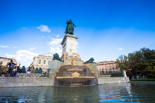 Madrid, Spain - May 10, 2012: Plaza de Oriente with tourists on a spring day in Madrid, Spain