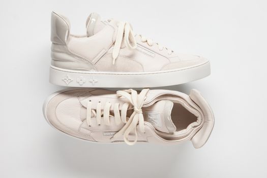 Ukraine, Kiev - FEBRUARY 2, 2015: Louis Vuitton sneaker closeup on white background.