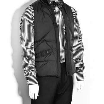 mannequin dressed in hipster male clothes on white background. white and black colour