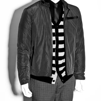 mannequin dressed in hipster male clothes on white background. white and black colour