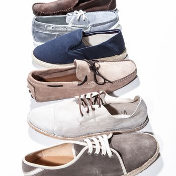 Set of trendy man footwear on a white background