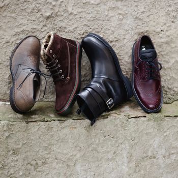 Set of trendy man footwear on a grunge background