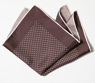Cotton squared brown handkerchief over white