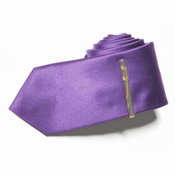 purple tie on a white background. Close up
