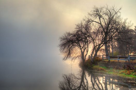 HDR landscape of a mystic foggy scene