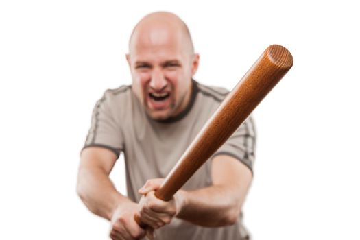 Violence and aggression concept - furious screaming angry man hand holding baseball sport bat 