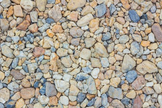 colorful pebble stones texture on the ground