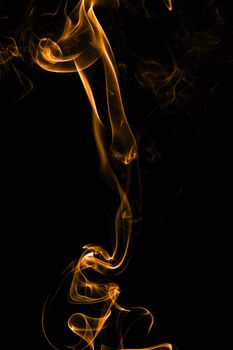 Beautiful smoke on the black background - macro photo