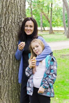 Photo of mother and daughter are eating