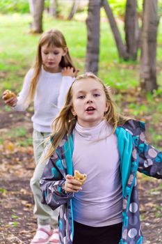 Photo of two beautiful girls in summer