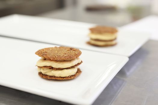 Sweets preparation on a restaurant kitchen