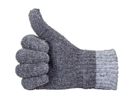 Thumb up showing by hand with gray knitting wool glove isolated on white background