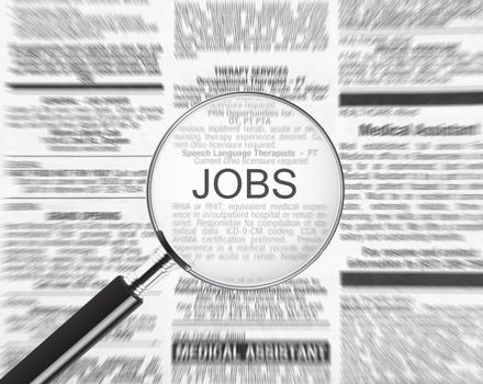 Jobs ad through a magnifying glass