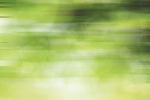 abstract green nature background, pentagon bokeh, fast motion