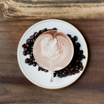 Cup of coffee on a wooden table