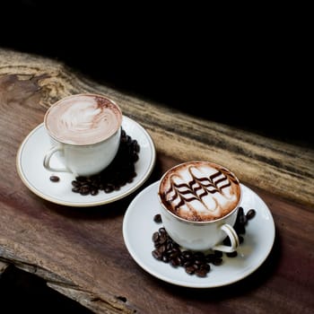 Cup of coffee on a wooden table