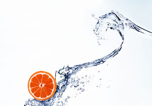 grapefruit in spray of water