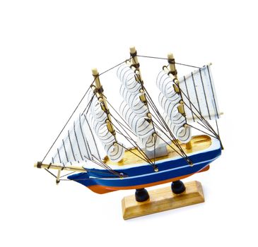 Wooden ship toy model, isolated on white background