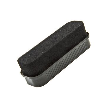 Black sponge for care of footwear, it is isolated on the white