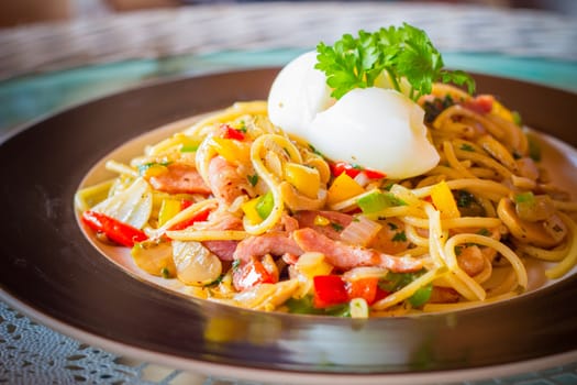 "Kee mao" Spaghetti, thai style spaghetti with boiled egg on the top.